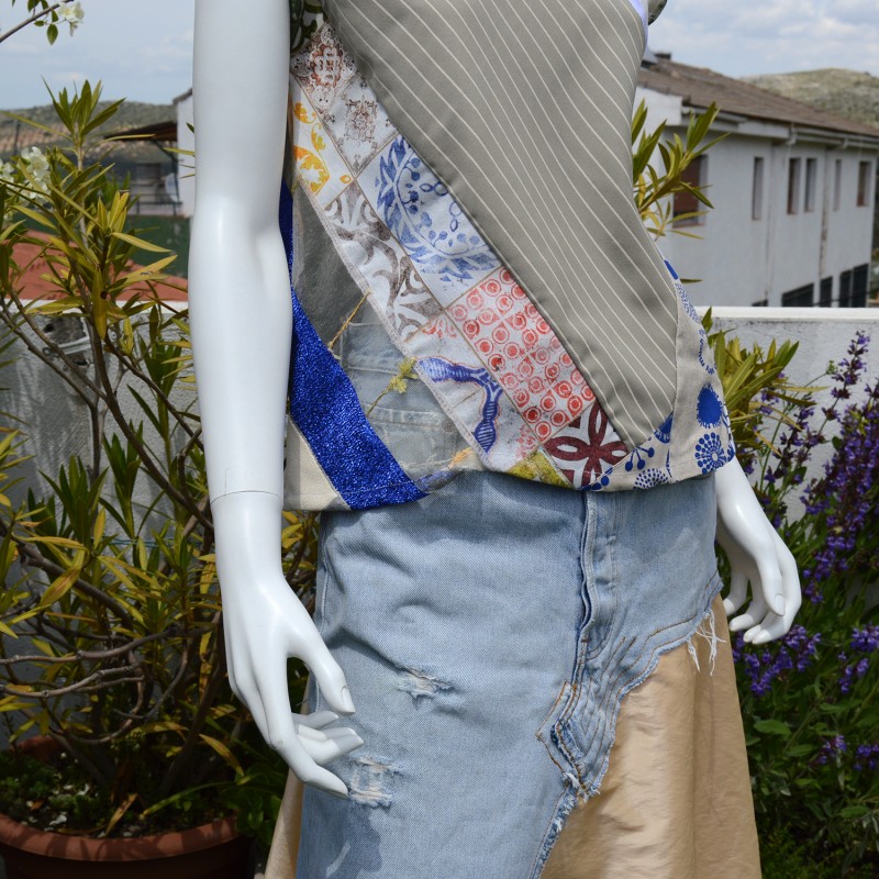 Detail of Top made in patchwork of different fabrics.