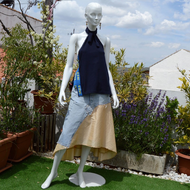 Upcycled denim skirt with a beige skirt and navy blue top