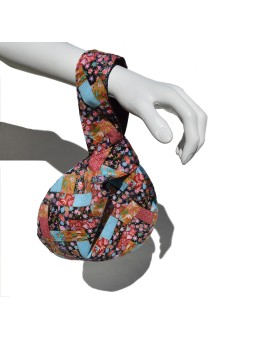 Shijimi bag with patchwork print of flower patterns