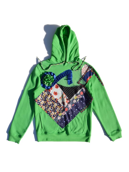 Sudadera verde con frontal de patchwork y transparencias