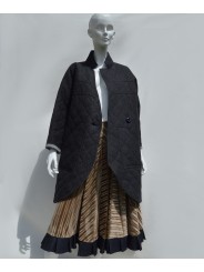 Beige cotton velvet skirt with a pleated denim hem, by San Fabrizzio.